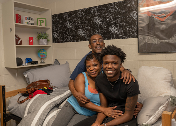 Family in dorm room