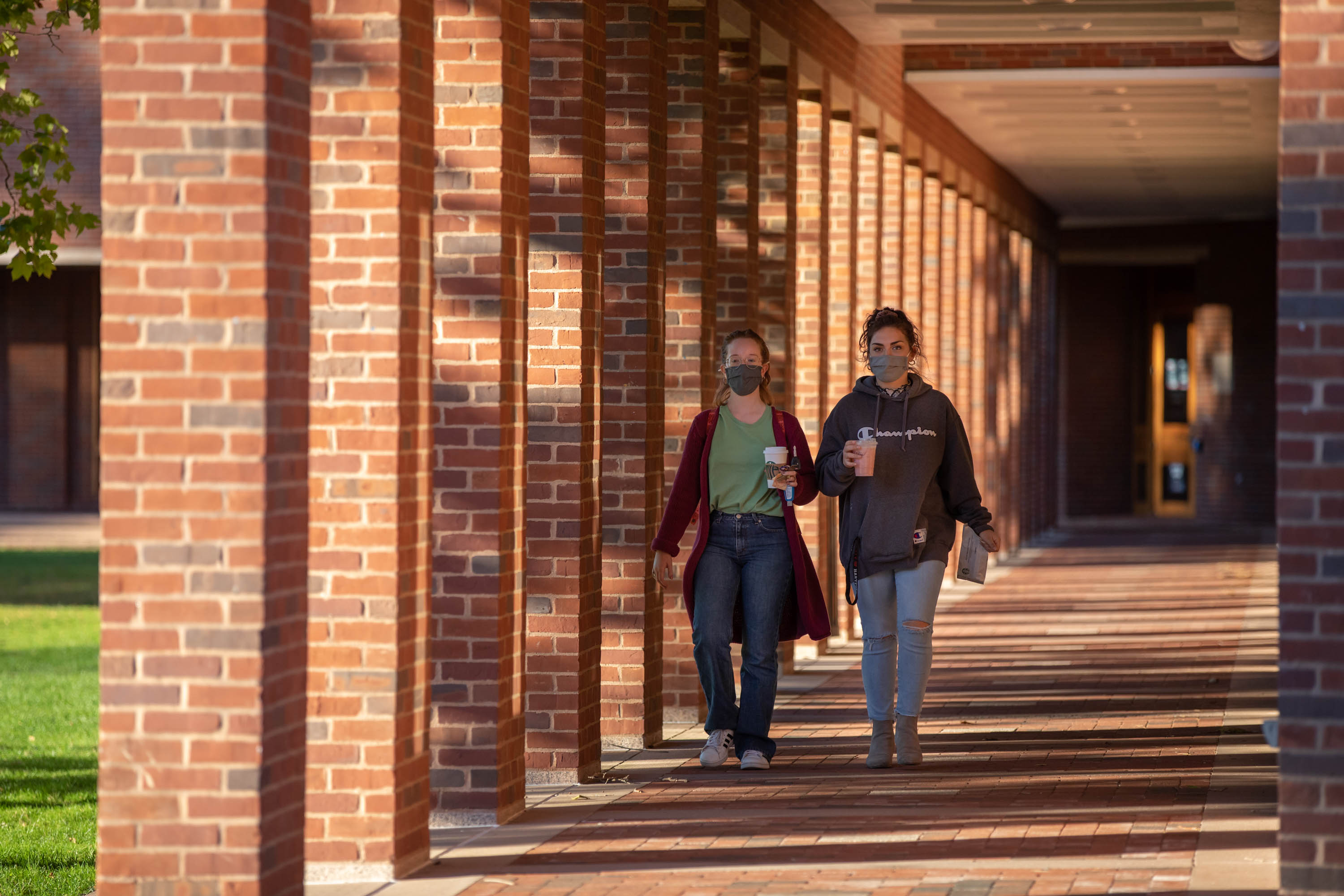 Students walking outside the library