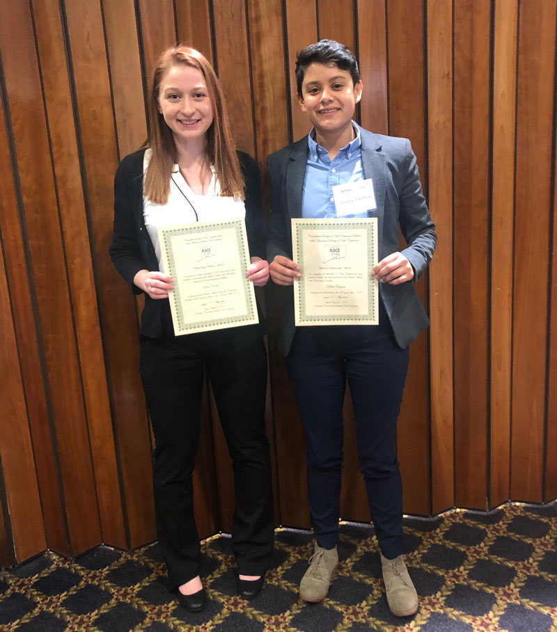 two students with awards