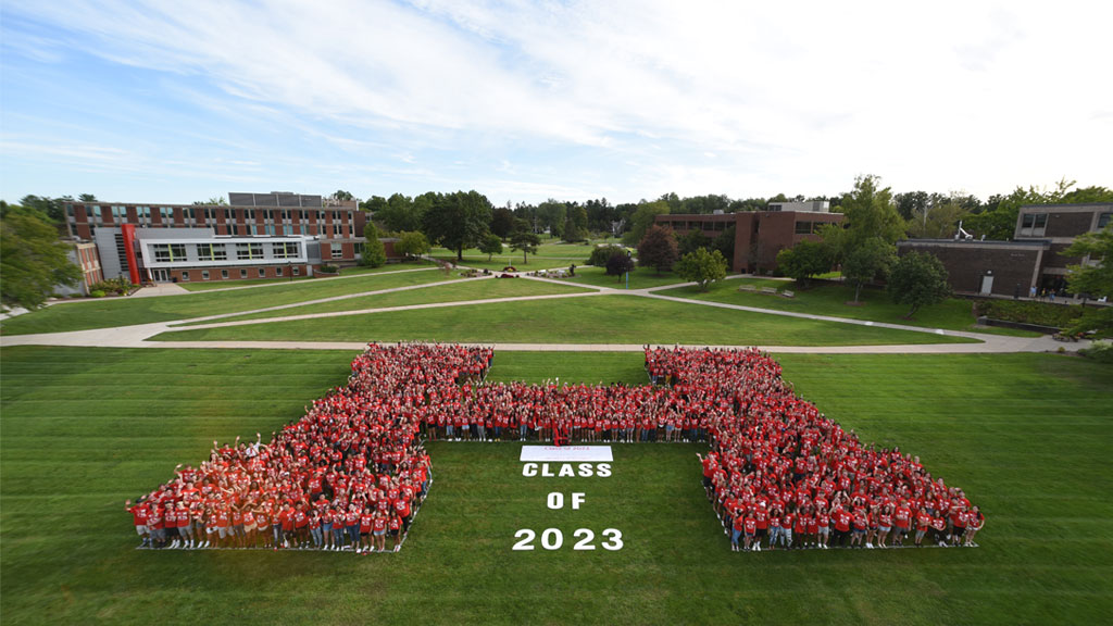 Students form a giant H on the lawn.