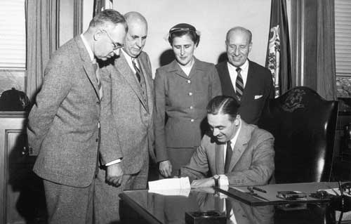 University founders sign the charter starting the University.