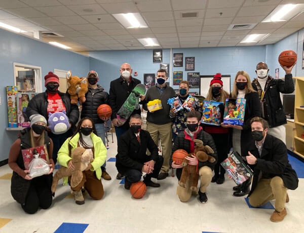 group photo of toy drive volunteers