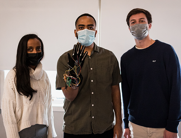 Poster #S5 team with project, Sign2Speak (from left to right: Barkot Melaku, Natenael Bekele, Joseph Pozzi) (photo by: Brody Monarca ’24)