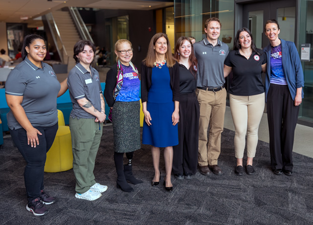 students and faculty members with the connecticut lieutenant governor