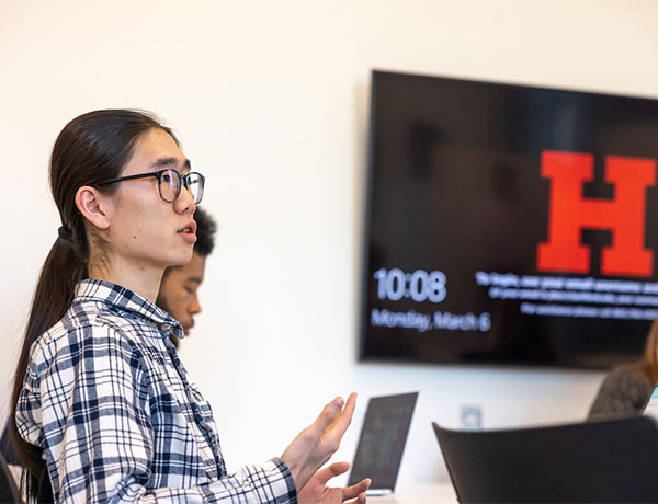 Barney student engaging in classroom dialogue