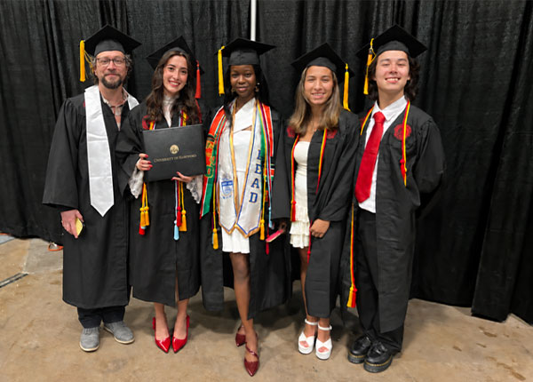 The student research team pictured at the May 2026 Commencement ceremony (from left): John Bennet, Olivia Dossias, Rhoddean “Shanny” Opinya, Amara Agosto, and Christopher Kokko.