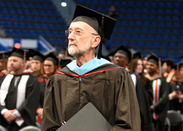 professor at university commencement