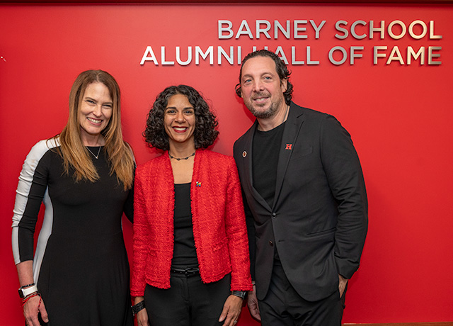 Hall of Fame inductees Jarrod Moses A’89, ’91 and Olivia Schmidt M’95 with Barney Dean Aarti S. Ivanic