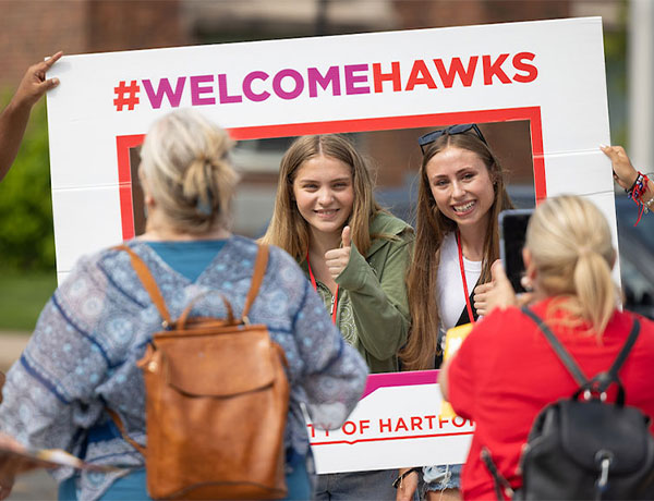 Welcoming new student to campus