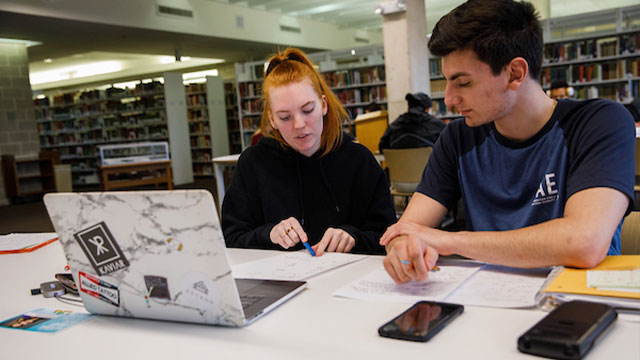 students working on a computer