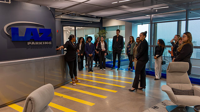 Students visiting LAZ Parking office