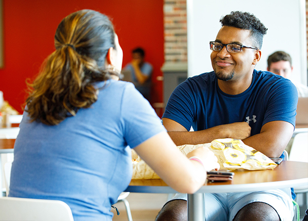 students sitting at table