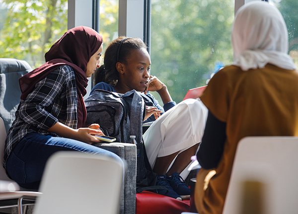 Students reading in library