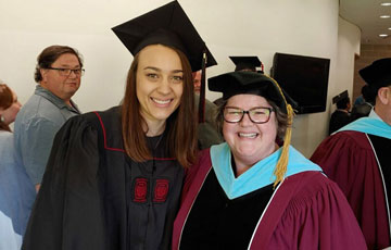 Mackenzie Ford (left) with Paige Bray, associate professor of early childhood education and director of Montessori Studies.