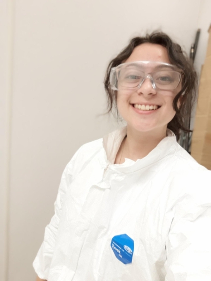 young woman in lab coat