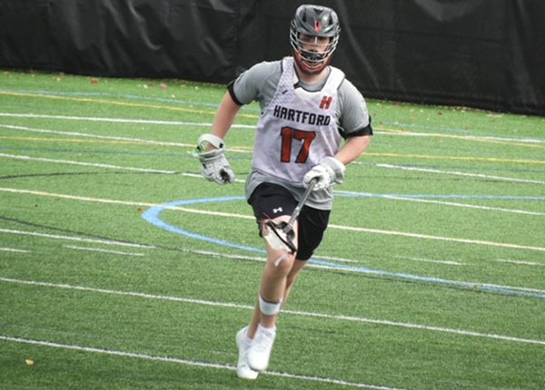 Ben Johnston ‘25 playing lacrosse