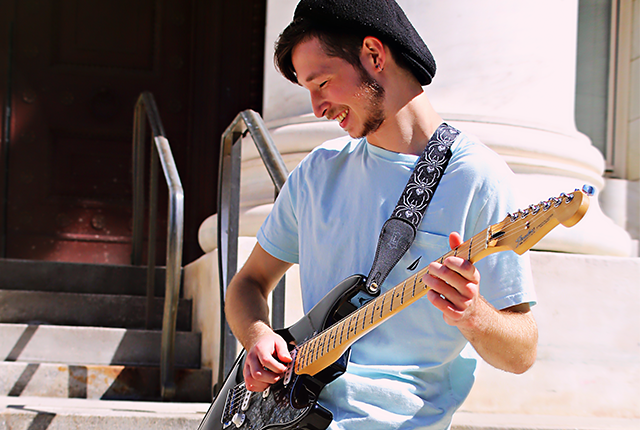 man playing guitar