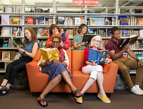 People reading on a couch