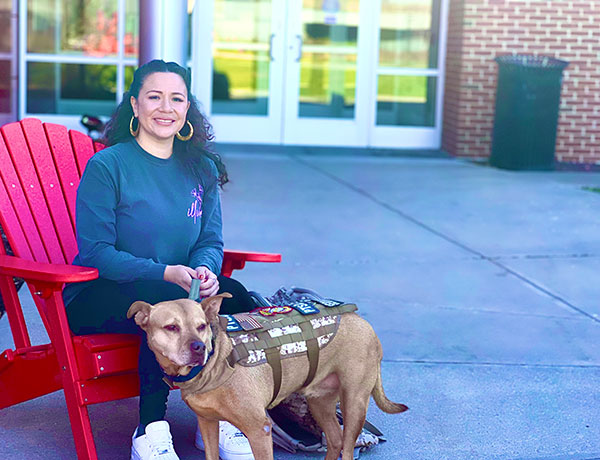 Veteran student and dog