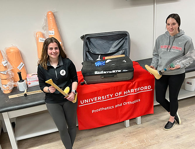 Students with a suitcase for Kenya