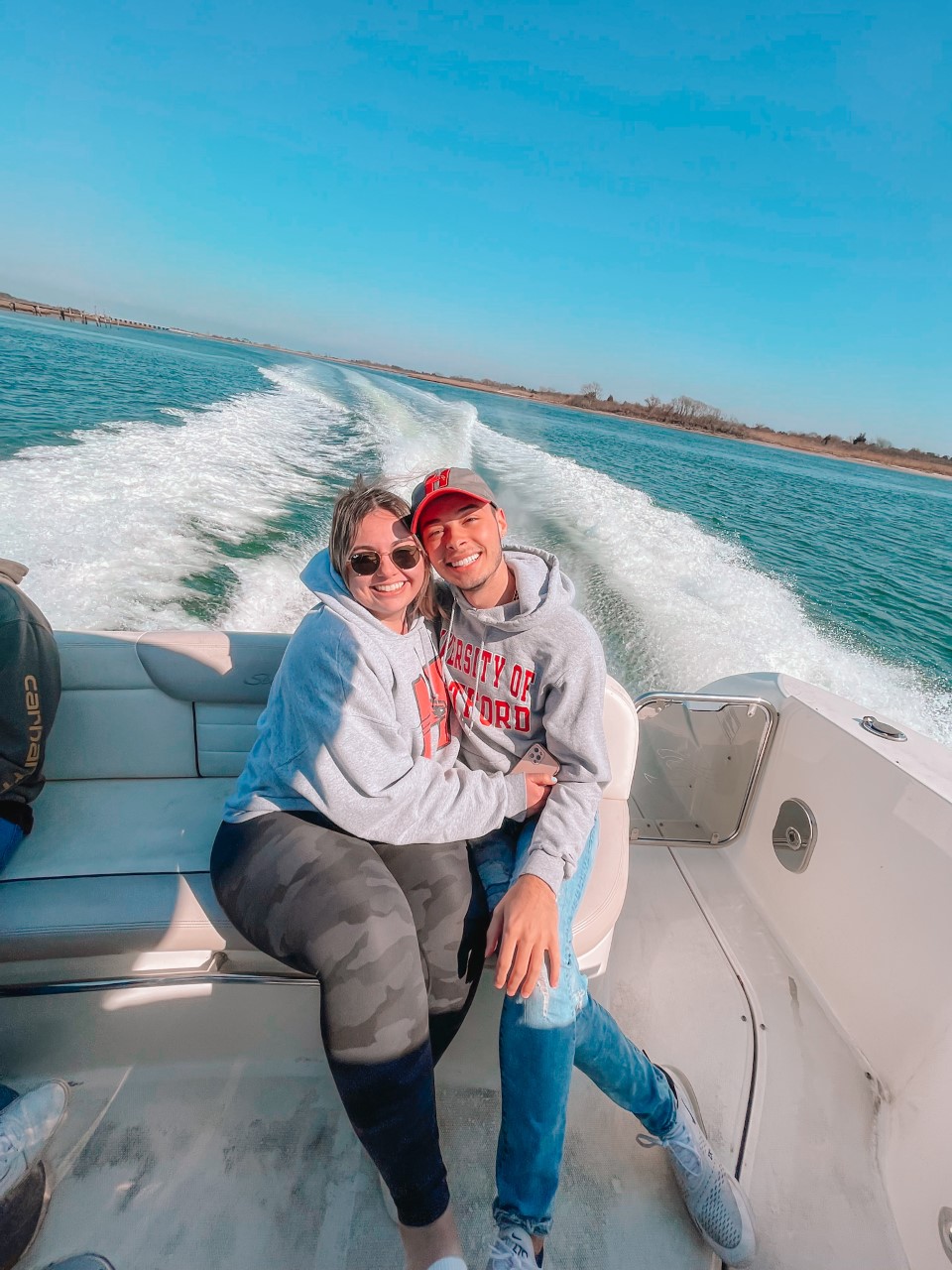 Ryan Hegney '23 and Kaitlyn Cummings '23 boating near Long Island